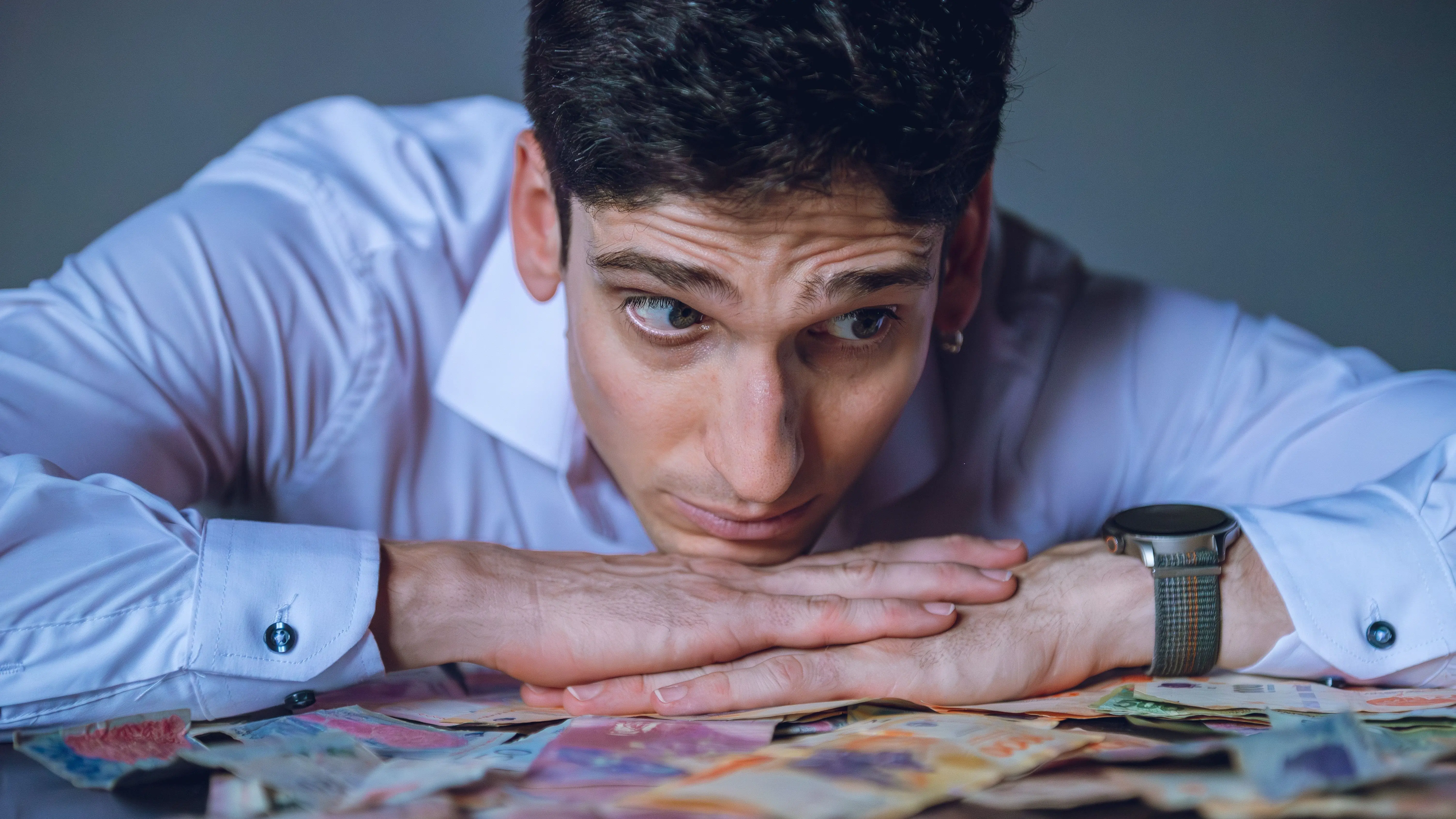 Late night phone with UPI debit notifications — emotional spending